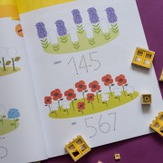 Монтессорі: світ досягнень. Моя перша книга з фантастичними наліпками. У саду