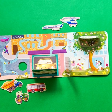 Книжка с окошками. Кто спрятался в городе